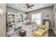 Bright home office features built-in shelving and comfortable seating at 416 Spring Place Ne Rd, White, GA 30184