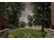 Stone pathway leads to scenic views from the yard at 416 Spring Place Ne Rd, White, GA 30184