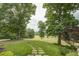 Stone pathway meanders through a beautifully landscaped yard at 416 Spring Place Ne Rd, White, GA 30184