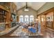 Open living room with stone fireplace and hardwood floors at 416 Spring Place Ne Rd, White, GA 30184