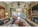 Living area features a large stone fireplace and hardwood floors at 416 Spring Place Ne Rd, White, GA 30184