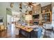 Spacious living room with stone fireplace and hardwood floors at 416 Spring Place Ne Rd, White, GA 30184