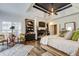 Bright main bedroom with hardwood floors and fireplace at 416 Spring Place Ne Rd, White, GA 30184