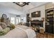 Spacious main bedroom with fireplace and built-in shelving at 416 Spring Place Ne Rd, White, GA 30184