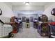 Finished basement with multiple arcade games at 56 Nightwind Trce, Acworth, GA 30101