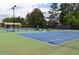 Two well-maintained tennis courts in a community setting at 56 Nightwind Trce, Acworth, GA 30101