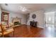 Open living area with fireplace, stairs to the upper level, and front door with sidelight at 814 Sunny Field Ln, Lawrenceville, GA 30043