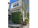 Charming two-story home featuring a light exterior, complemented by lush greenery and a quaint entrance at 2057 Telfair Cir, Atlanta, GA 30324