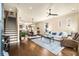 Open concept living room with hardwood floors, staircase, and stylish decor at 2057 Telfair Cir, Atlanta, GA 30324