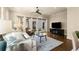 Well-lit living room with large windows, comfortable seating, and modern furnishings at 2057 Telfair Cir, Atlanta, GA 30324