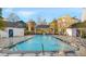 Relax and unwind by the sparkling community pool, featuring a gazebo and charming outbuildings at 2057 Telfair Cir, Atlanta, GA 30324