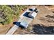 Aerial view of property with multiple outbuildings at 4320 Center Hill Church Rd, Loganville, GA 30052