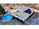 House with gray roof, white siding, and above-ground pool at 4320 Center Hill Church Rd, Loganville, GA 30052