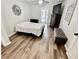 Simple bedroom with hardwood floors and access to a deck at 4320 Center Hill Church Rd, Loganville, GA 30052
