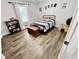Charming bedroom with a metal bed frame and LVP flooring at 4320 Center Hill Church Rd, Loganville, GA 30052