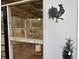 Rustic chicken coop with metal rooster decoration at 4320 Center Hill Church Rd, Loganville, GA 30052
