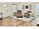 Bright living room with hardwood floors and comfortable seating at 4320 Center Hill Church Rd, Loganville, GA 30052
