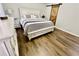 Main bedroom with king-size bed and built-in drawers at 4320 Center Hill Church Rd, Loganville, GA 30052