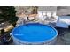 Large above ground pool with surrounding deck at 4320 Center Hill Church Rd, Loganville, GA 30052