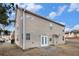 Two-story home with neutral siding, backyard, and patio at 436 Margaux Way, Atlanta, GA 30349