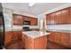 Kitchen with stainless steel appliances, granite counters, and kitchen island at 436 Margaux Way, Atlanta, GA 30349