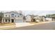 Street view of multiple two-story houses, showcasing neighborhood and landscaping at 776 Clifftop Crossing, Powder Springs, GA 30127