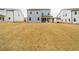 Large backyard with mature grass, providing ample outdoor space at 776 Clifftop Crossing, Powder Springs, GA 30127