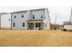 Spacious backyard with grassy area and a view of the house at 776 Clifftop Crossing, Powder Springs, GA 30127