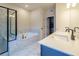 Bathroom boasts a soaking tub, walk-in shower, and double vanity at 776 Clifftop Crossing, Powder Springs, GA 30127