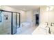 Elegant bathroom with soaking tub, walk-in shower, and double vanity at 776 Clifftop Crossing, Powder Springs, GA 30127