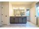 Modern bathroom with gray double vanity and large mirror at 776 Clifftop Crossing, Powder Springs, GA 30127