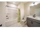 Well-lit bathroom featuring modern fixtures, a combined tub and shower, and ample counter space at 776 Clifftop Crossing, Powder Springs, GA 30127