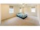 Cozy bedroom with ceiling fan and neutral color palette at 776 Clifftop Crossing, Powder Springs, GA 30127