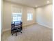 Spacious bedroom with carpeted floors and two windows at 776 Clifftop Crossing, Powder Springs, GA 30127