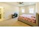 Comfortable bedroom with a neutral color scheme, carpet, and natural light streaming through the windows at 776 Clifftop Crossing, Powder Springs, GA 30127