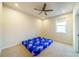 Bright bedroom with ceiling fan and carpeted floor at 776 Clifftop Crossing, Powder Springs, GA 30127