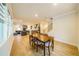 Dining area with hardwood floors, and view into kitchen and living room at 776 Clifftop Crossing, Powder Springs, GA 30127