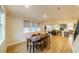 Dining area with hardwood floors, and view into kitchen and living room at 776 Clifftop Crossing, Powder Springs, GA 30127