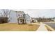 Two-story house with gray siding and stone accents at 776 Clifftop Crossing, Powder Springs, GA 30127