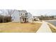 Two-story house with gray siding and stone accents at 776 Clifftop Crossing, Powder Springs, GA 30127