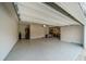 Spacious garage with epoxy flooring and extra storage space at 776 Clifftop Crossing, Powder Springs, GA 30127