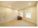 Bright home office features neutral walls, new carpet, and plenty of natural light at 776 Clifftop Crossing, Powder Springs, GA 30127
