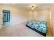 Large main bedroom with ensuite bathroom and neutral decor at 776 Clifftop Crossing, Powder Springs, GA 30127