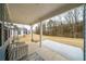 Covered patio with backyard view, perfect for outdoor relaxation at 776 Clifftop Crossing, Powder Springs, GA 30127