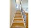 Elegant staircase with wood treads and black metal balusters at 776 Clifftop Crossing, Powder Springs, GA 30127