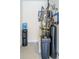 Water softener and water heater in a well-maintained utility closet at 776 Clifftop Crossing, Powder Springs, GA 30127