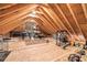 Unfinished attic with exposed beams, offering potential for storage or customization at 764 Little Vine Church Rd, Villa Rica, GA 30180