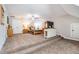 Spacious bedroom with carpeted floors, neutral walls, and a step up to the sleeping area at 764 Little Vine Church Rd, Villa Rica, GA 30180