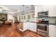Bright kitchen has stainless appliances and leads to a cozy living space at 764 Little Vine Church Rd, Villa Rica, GA 30180