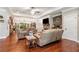 Spacious living room with hardwood floors, fireplace, and modern decor at 764 Little Vine Church Rd, Villa Rica, GA 30180